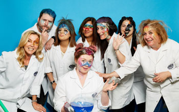 Mad scientist with face paint wearing mad science lab coats